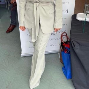 This amazing suit is a show stopper! Blazer, belt and pants included.